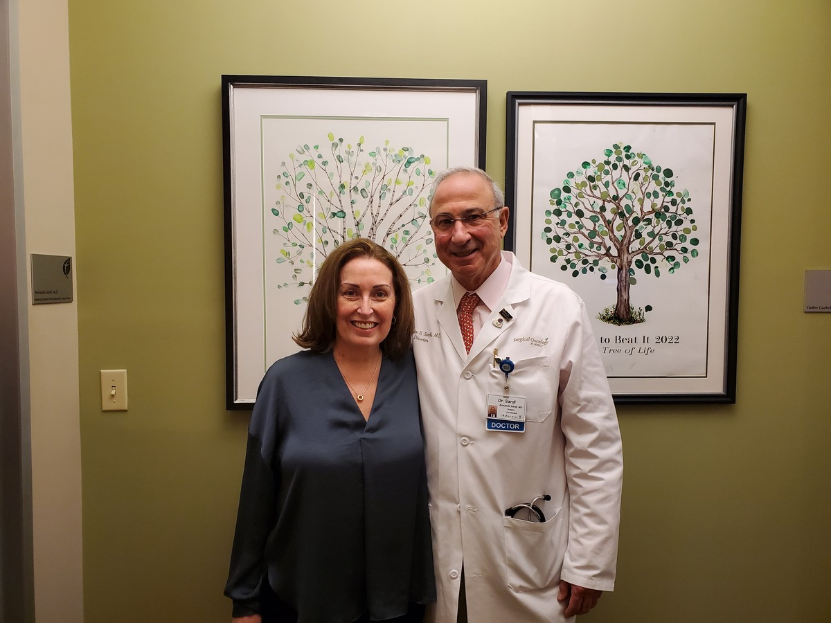 Allison Ducluzeau with her doctor after receiving treatment.