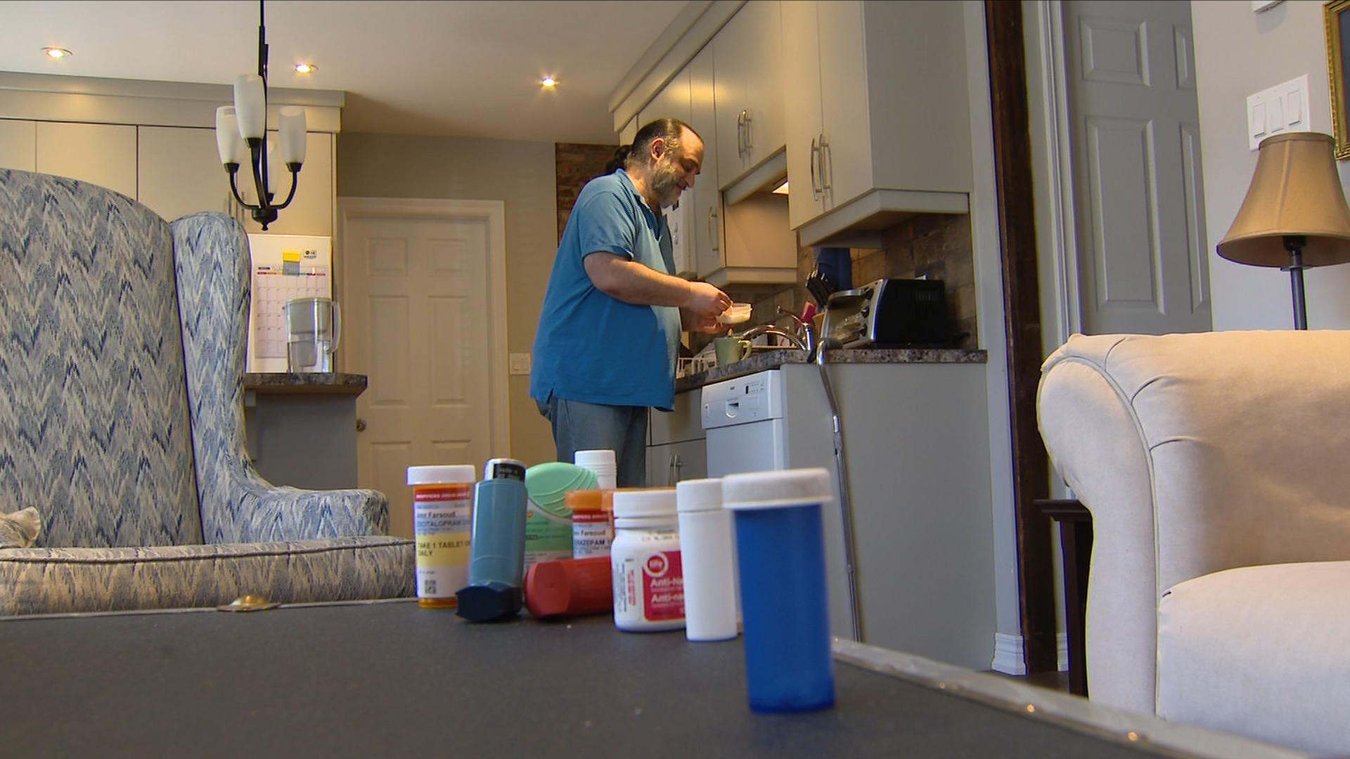 Amir Farsoud in the kitchen of his rooming house in St. Catharines.